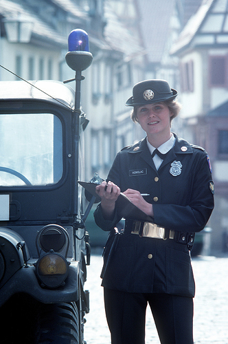a-us-army-military-policewoman-checks-her-paperwork-1973-1600